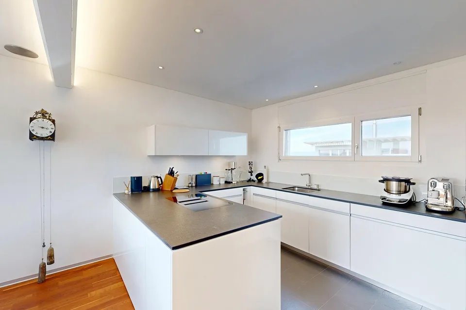 Exklusive Attikawohnung mit 54 m² Sonnenterrasse – 1 Einstellhallenplatz inklusive