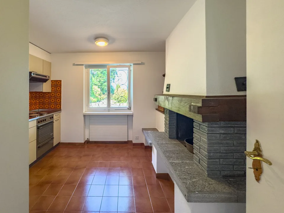 Villa con giardino e vista aperta sul golfo di Lugano a Carona