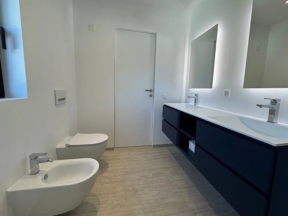 Splendido 3.5 locali a piano terra con giardino, a due passi dal lago – Foto 10 von 18