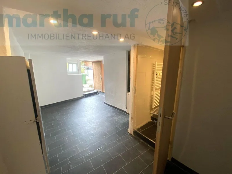 House with apartment and retail space – photo 8 of 9