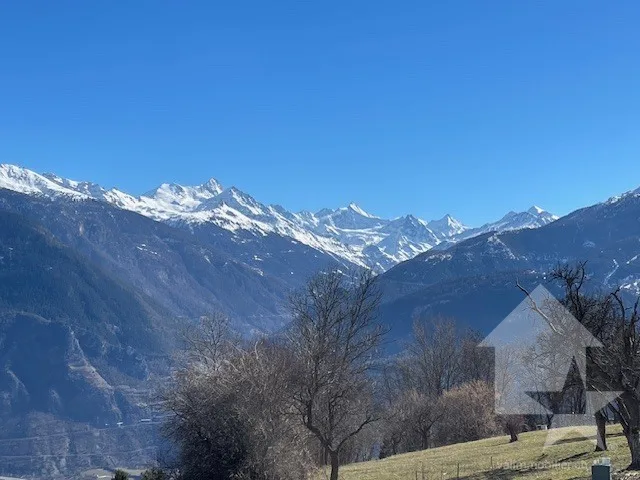 Terrain à bâtir, en pente douce, au calme et avec vue panoramique