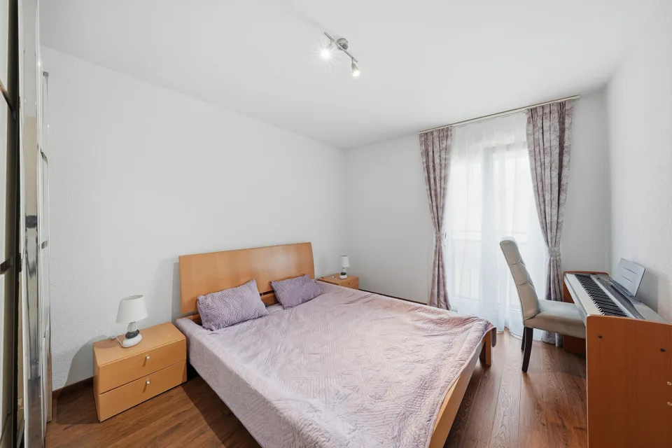 À DEUX PAS DES RIVES - SPACIEUX ATTIQUE AVEC BALCON ET VUE LAC – photo 13 sur 13