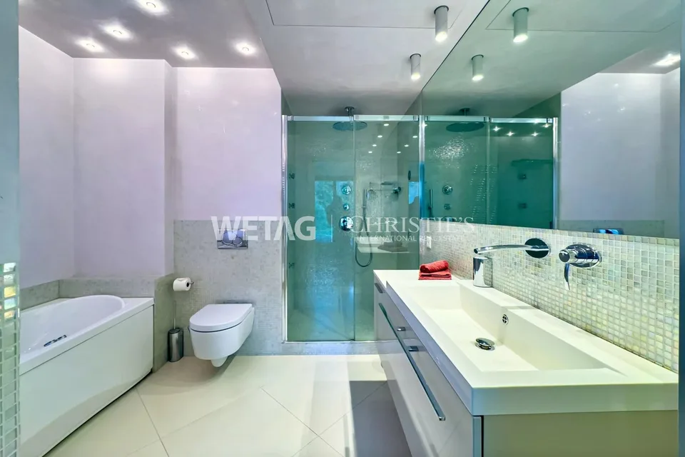 Zum Verkauf in Lugano: Moderne Duplex-Wohnung mit privatem Garten & herrlicher Seesicht, auch als Zweitwohnsitz möglich – Foto 8 von 13