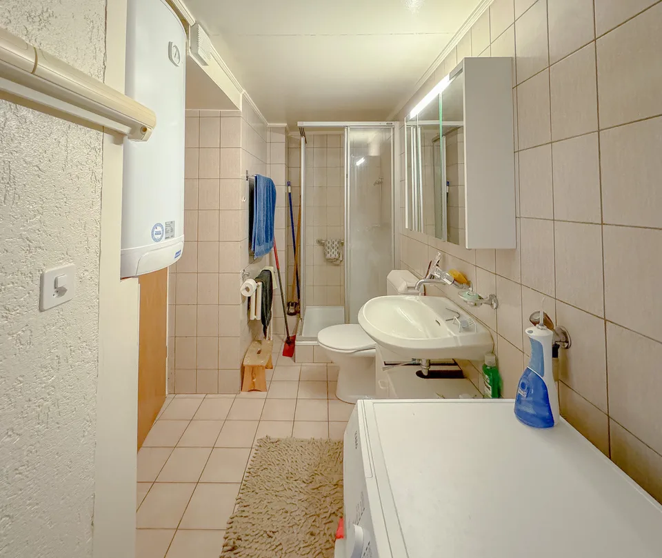 Edificio residenziale con 4 appartamenti e 1 unità commerciale nel cuore di Ste-Croix – foto 10 di 13