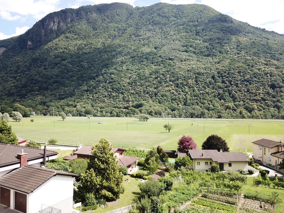 Appartement en attique de 4,5 pièces avec jardin privé, Lumino – photo 15 sur 17