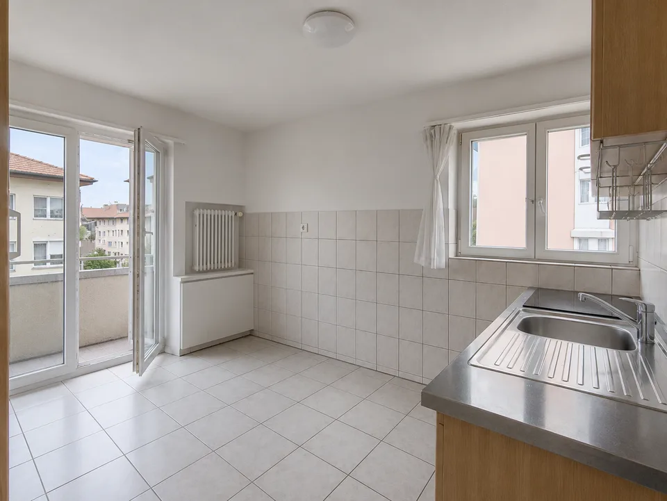 Appartamento accogliente di 3.5 locali con balcone in zona tranquilla in affitto