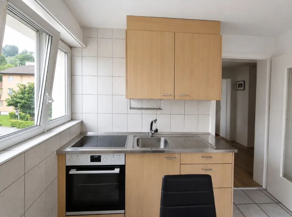 Appartamento accogliente di 3.5 locali con balcone in zona tranquilla in affitto