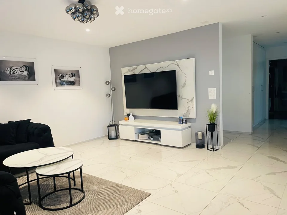 Wohnung mit 4.5 Zimmern und privatem Garten