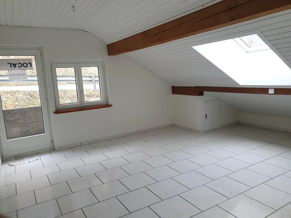 Appartamento mansardato con 3 locali e balcone