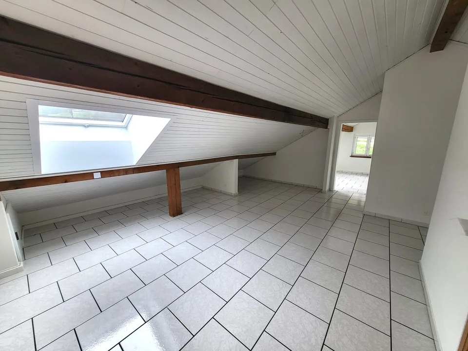 Appartamento mansardato con 3 locali e balcone
