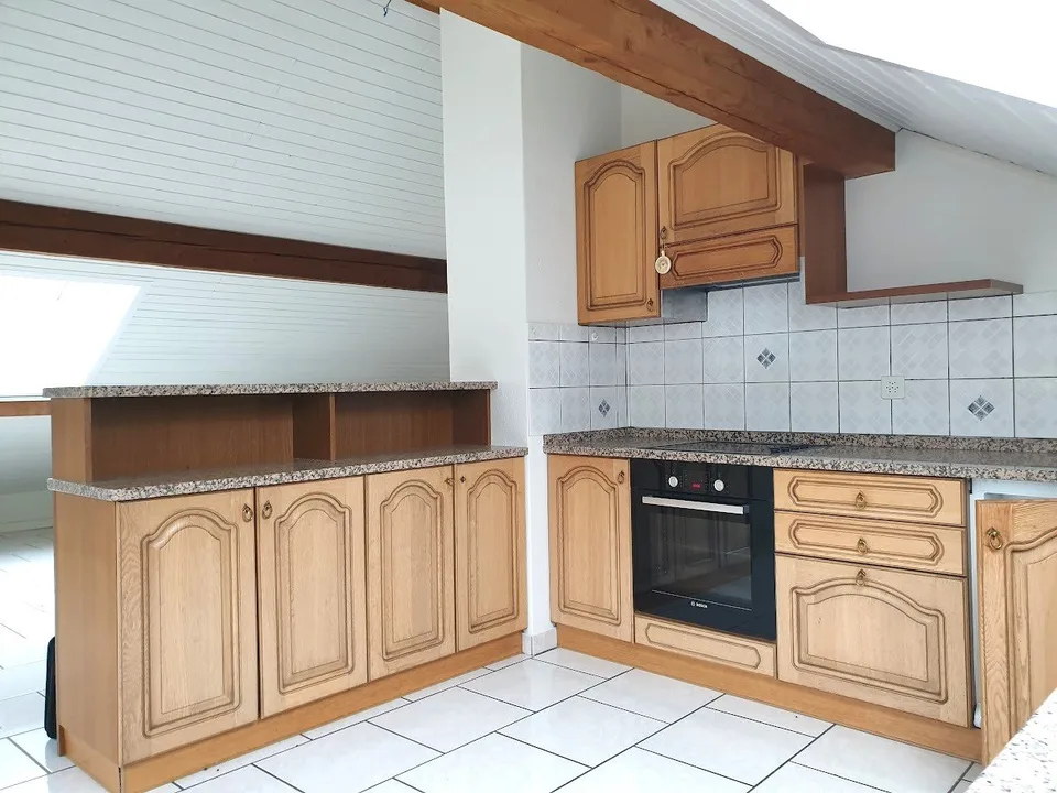 Appartamento mansardato con 3 locali e balcone