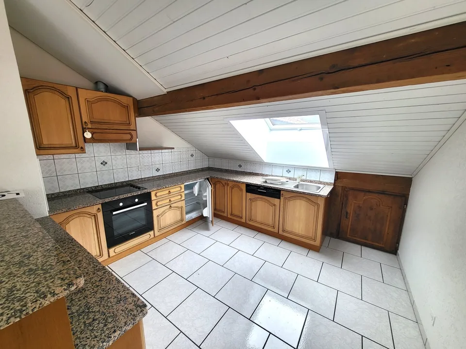 Appartement 3 pièces mansardé avec balcon