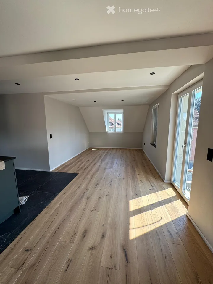 Appartamento mansardato di 4,5 locali completamente ristrutturato con balcone