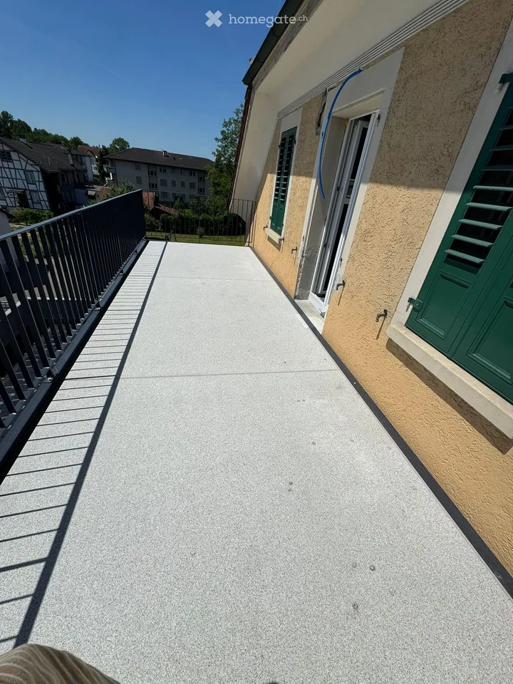 Appartamento mansardato di 4,5 locali completamente ristrutturato con balcone