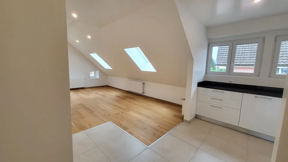 Charmant appartement sous les toits de 2,5 pièces à Val-de-Travers