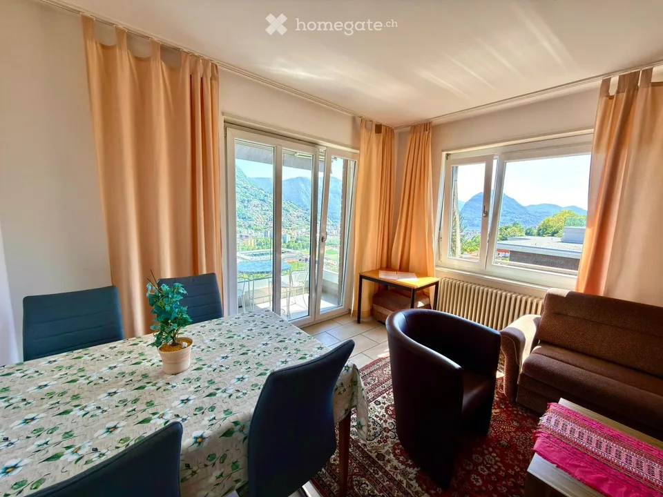 Wohnung mit Möbeln in Porza mit Seeblick