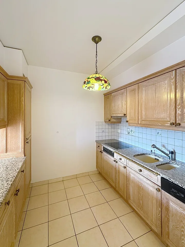 Charmanter 2.5-Zimmer-Wohnung im 1. Stock in Villars-sur-Glâne