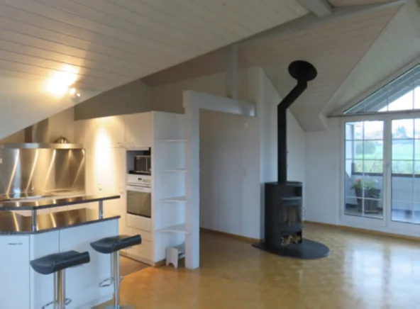 Appartement mansardé accueillant dans un emplacement central avec vue sur la verdure