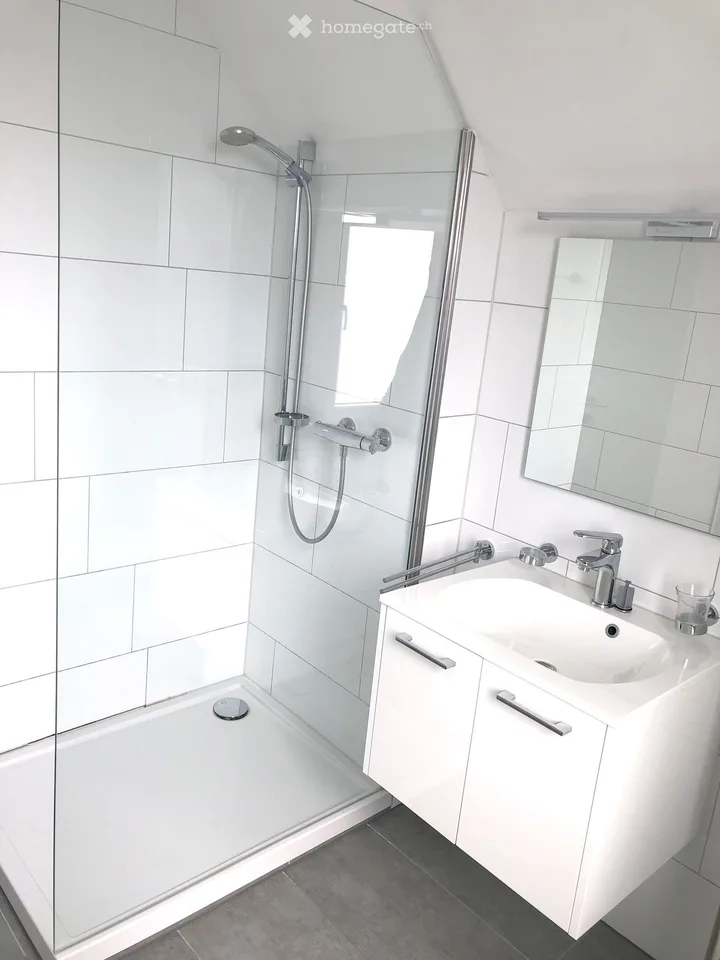 Appartamento mansardato moderno 2.5 locali con balcone in posizione centrale