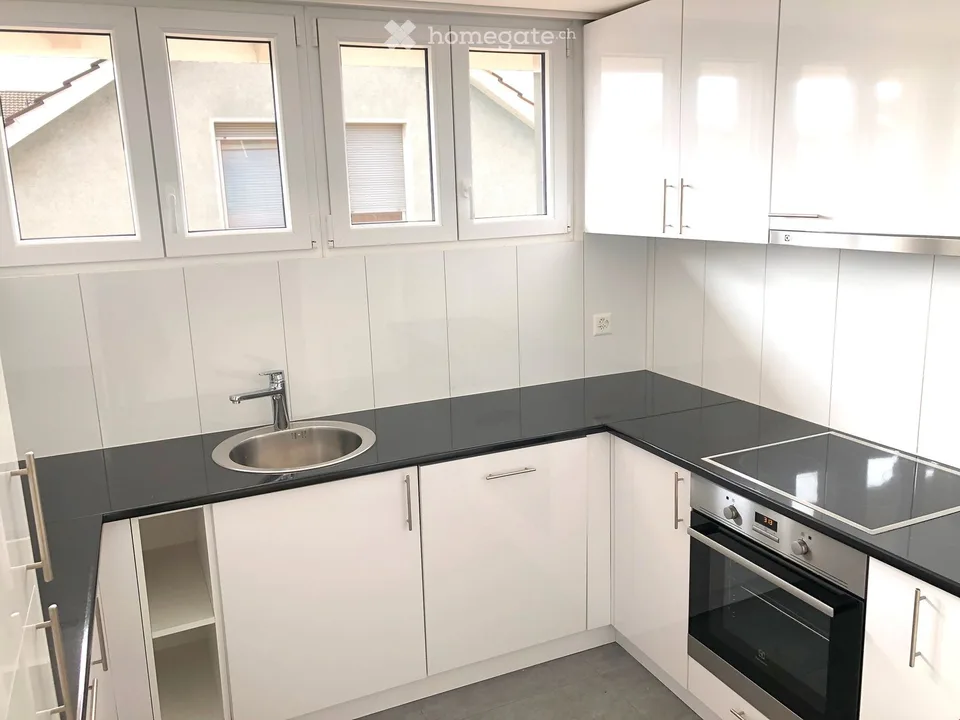 Appartamento mansardato moderno 2.5 locali con balcone in posizione centrale