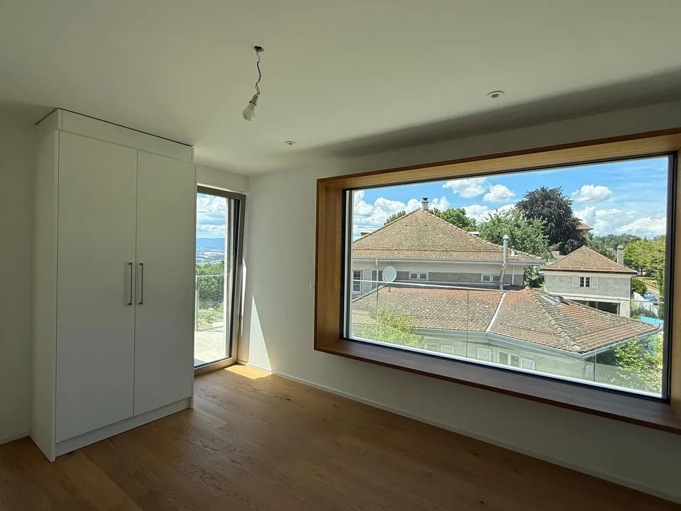 Appartamento mansardato di 2,5 locali con grande terrazza e vista sul lago – foto 7 di 9