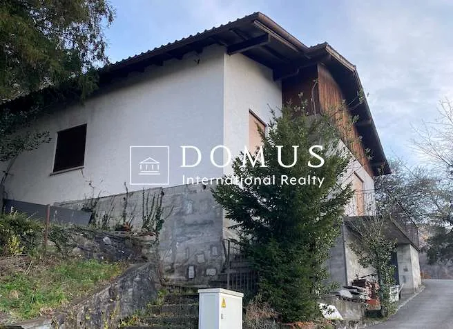Terreno edificabile 1700m2 con casa in posizione collinare