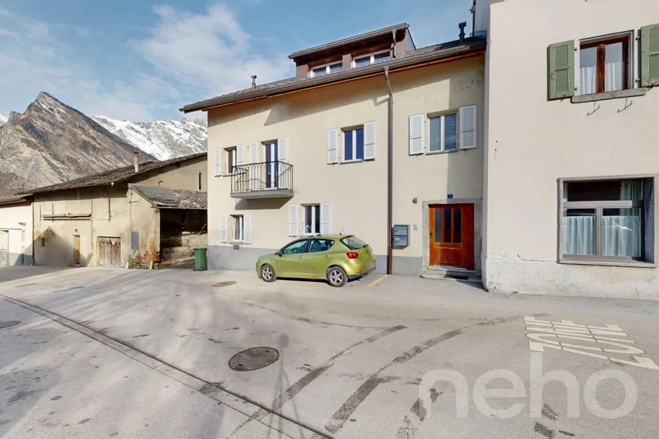 Charming 3.5-room apartment with large garden in the center of Riddes – photo 14 of 14