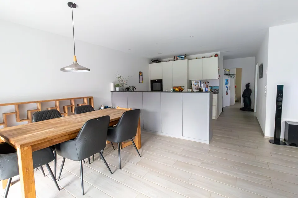 Appartement de 3,5 pièces au rez-de-chaussée loué avec 1 place de parking à vendre