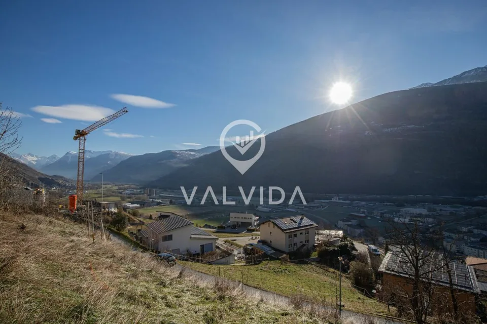 Sunny building land with project in Steg