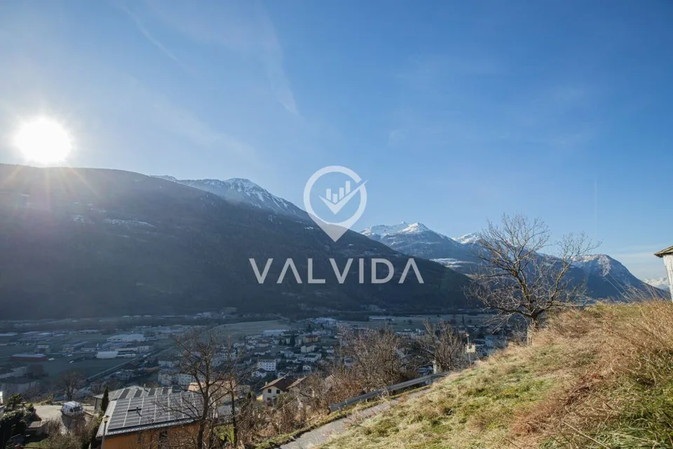 Sunny building land with project in Steg