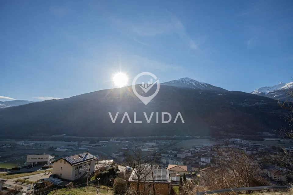 Sunny building land with project in Steg