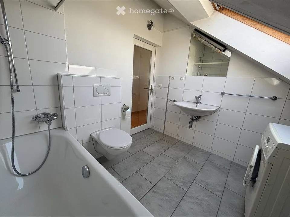 Appartamento mansardato da sogno con vista sul lago a Erlenbach ZH