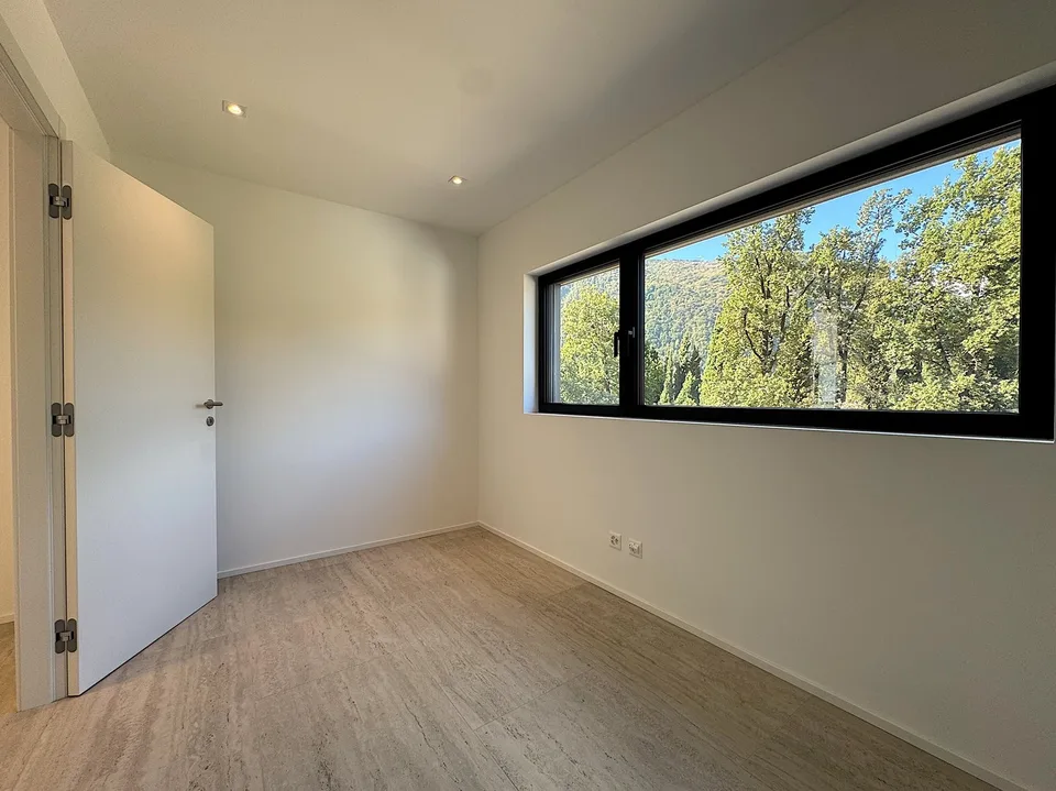 Elegante 4.5 locali al primo piano con terrazza e parziale vista lago – Foto 8 von 18
