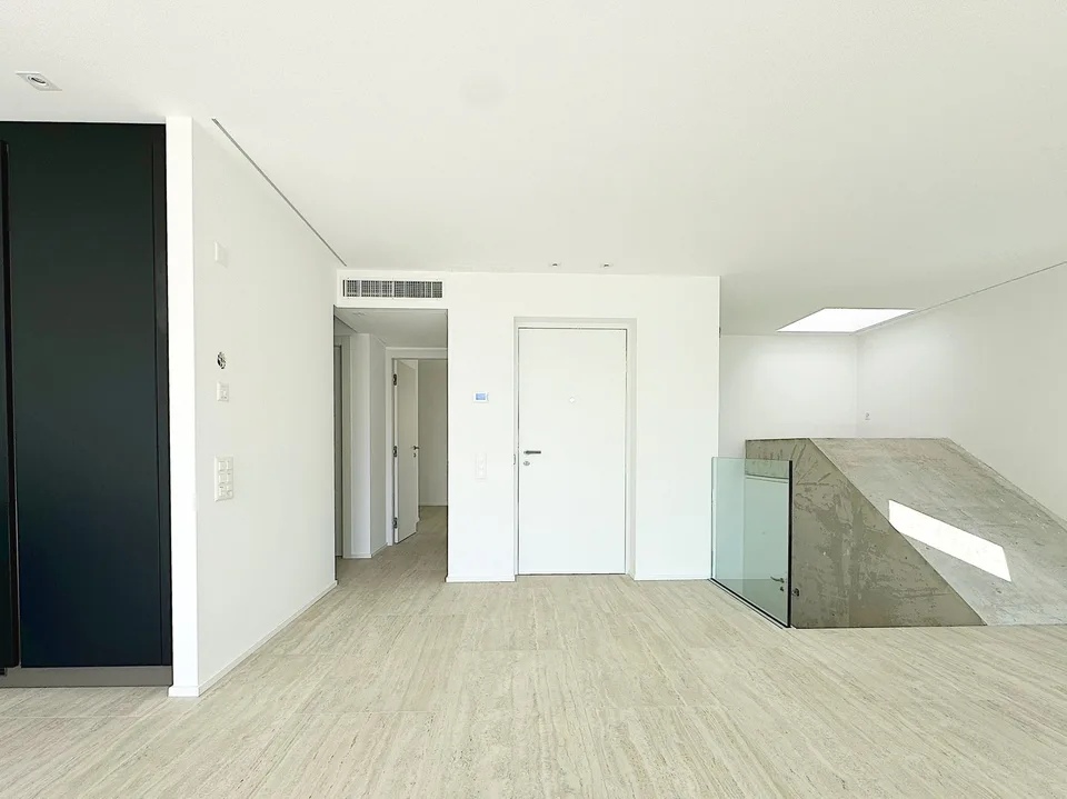 Elegante 4.5 locali al primo piano con terrazza e parziale vista lago – Foto 7 von 18