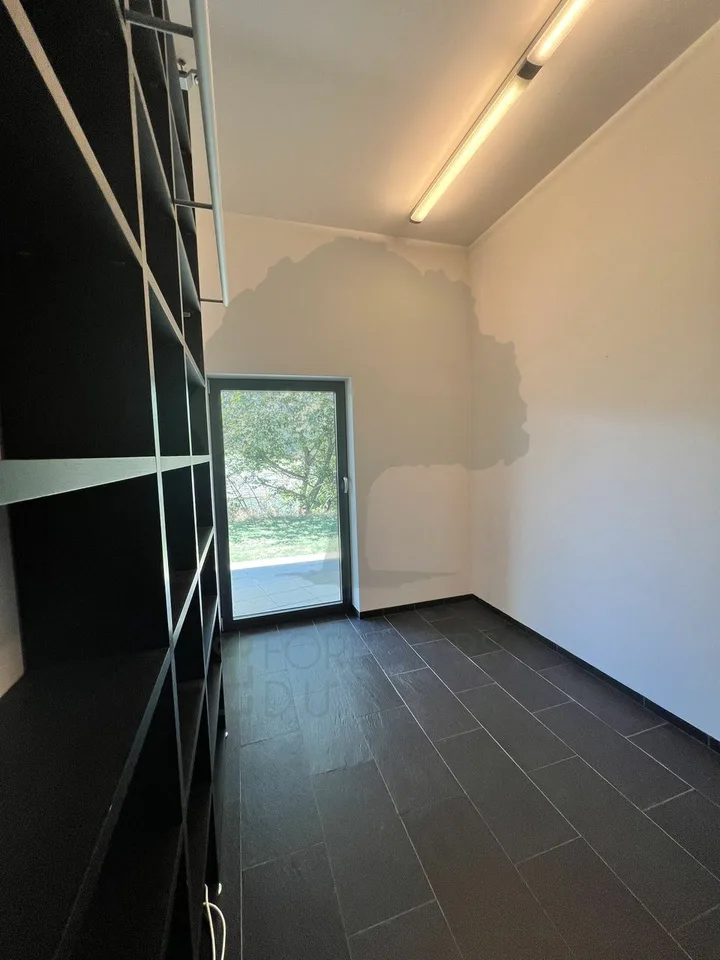 Magnifica casa di architetto di 300m2 su un terreno di 2'333m2