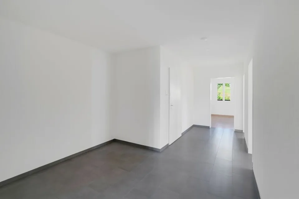 Ampio appartamento di giardino 5,5 locali con una vista incantevole sul verde