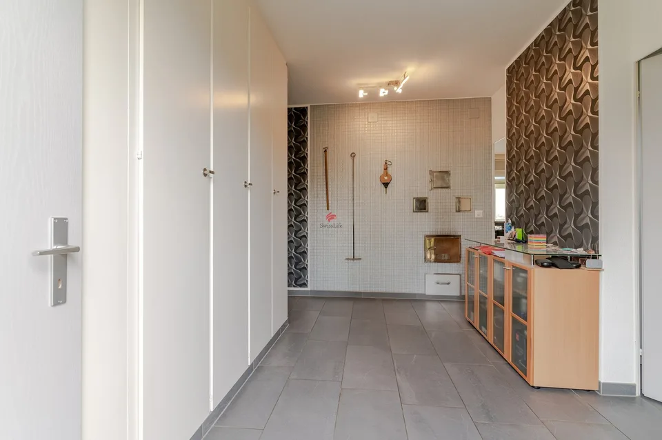 Casa unifamiliare con laboratorio + studio