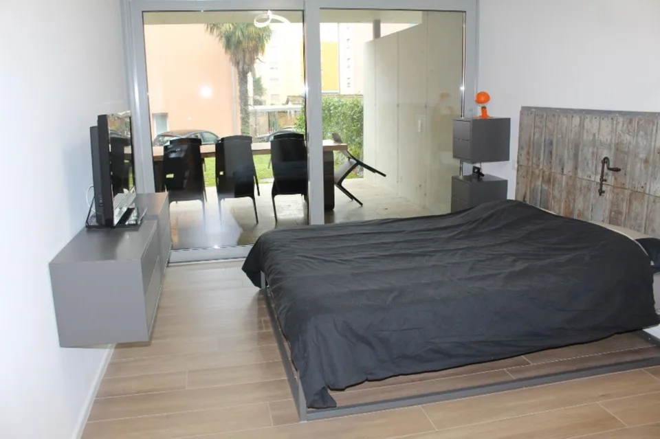 Appartamento 2 ½ locali con grande terrazza coperta e giardino esclusivo – foto 9 di 13