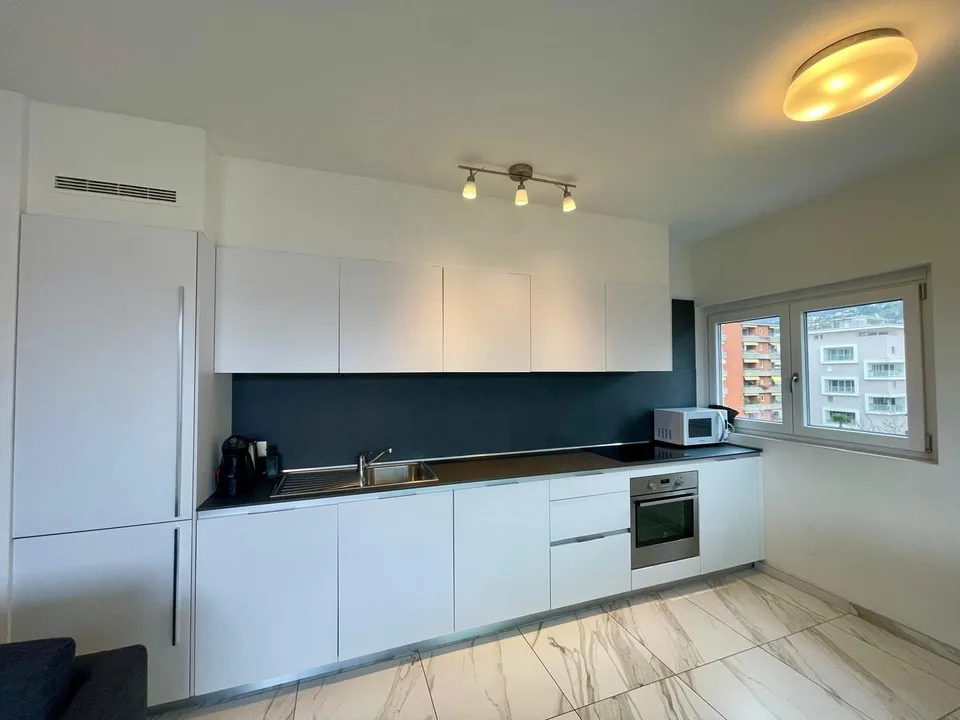 MODERNO E LUMINOSO BILOCALE CON DOPPIO BALCONE