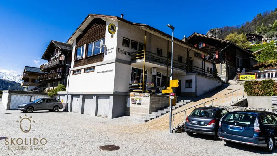 Einkaufsladen, grosses Restaurant mit Terrasse, Wohnung auf 2 Etagen, Garagen und Bauland im Herzen von Mund – Foto 22 von 30