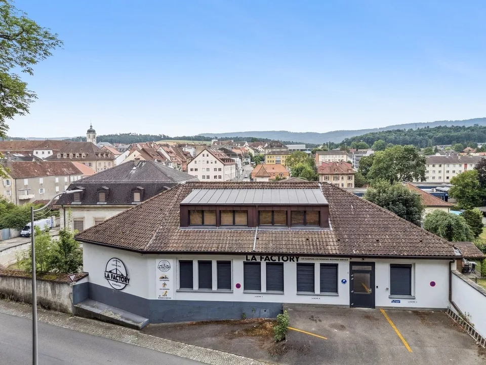 Prächtiges Mietshaus, renoviert im Zentrum von Porrentruy – Foto 6 von 13