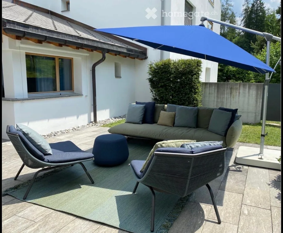Exklusive Terrassenwohnung mit Garten in Flims Waldhaus