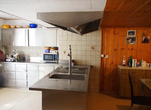 Wohnhaus mit Gewerbefläche und Entwicklungspotenzial in Trun – Foto 8 von 20