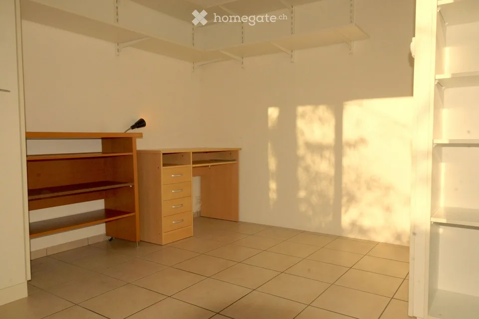 Lichtdurchflutete 3,5 Zimmer EG Wohnung