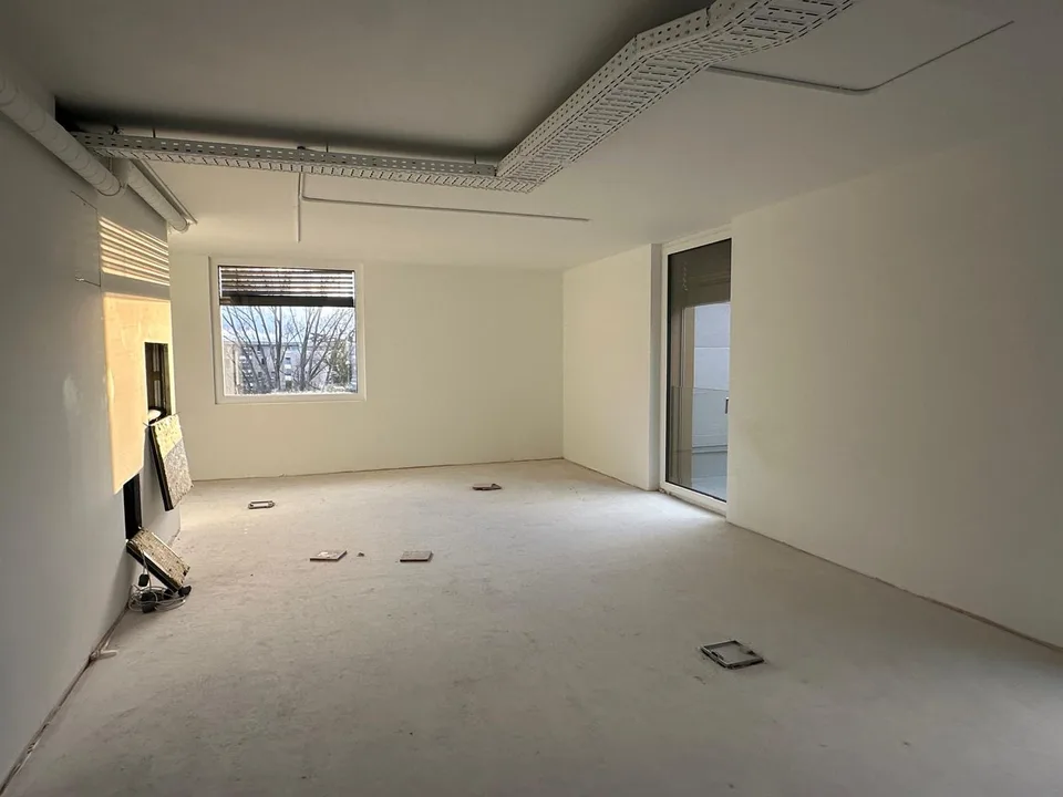 Surface commerciale neuve de 98 m² – à aménager au gré du preneur