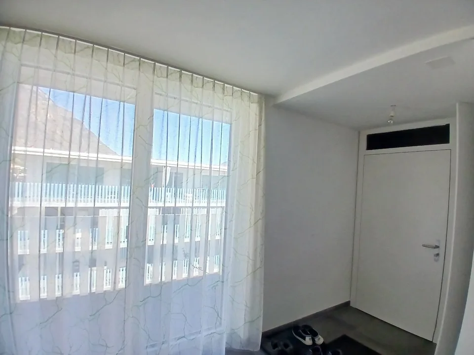 Modern 2.5-room apartment with balcony and mountain view in Fully