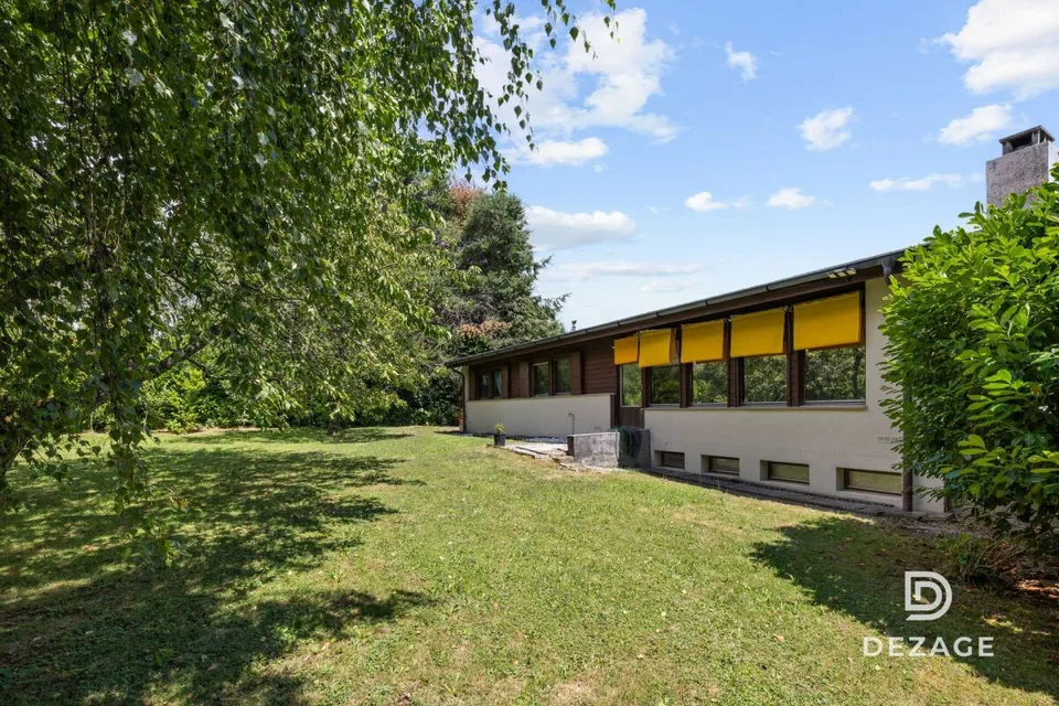 Maison à rénover avec potentiel d'agrandissement sur une vaste parcelle arborée !