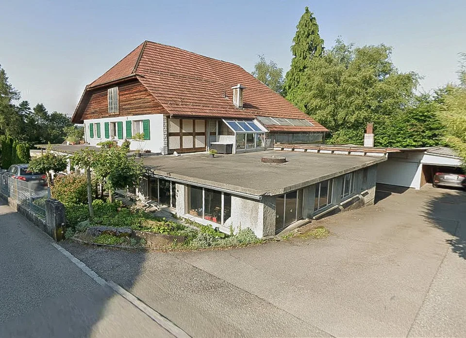 Grosses 2-Familienhaus mit mechanischer Werkstatt