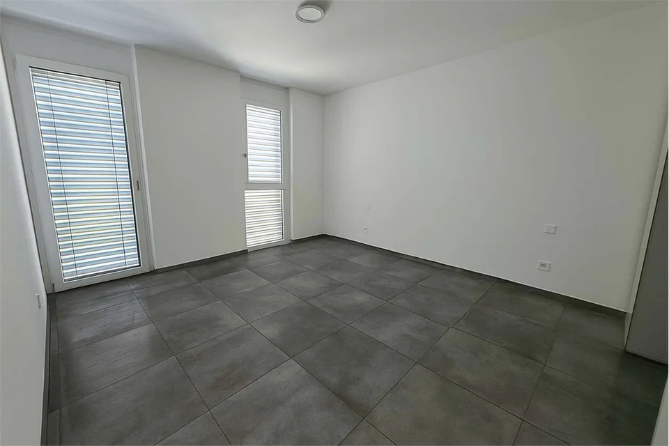 Appartamento 3.5 locali con terrazzo – Foto 10 von 13