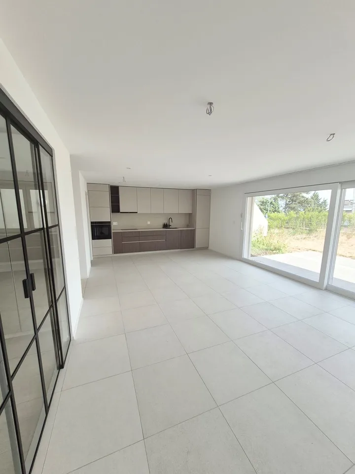 Un jardin comme une villa. Le confort d'un appartement neuf.